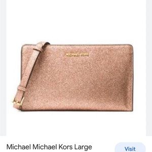 Like new Michael Kors rose gold glitter cross body purse
